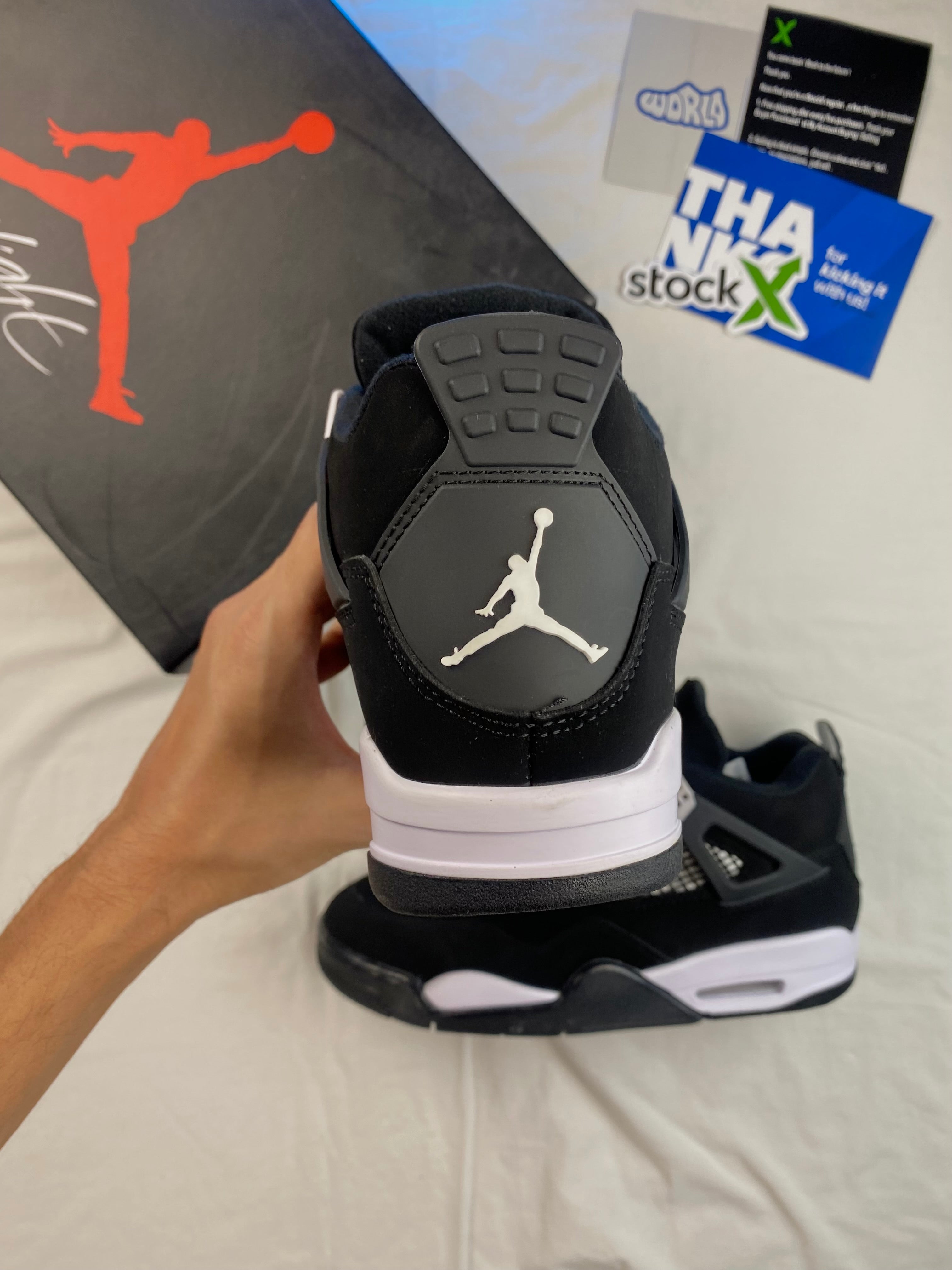 Air Jordan 4 Retro 'White Thunder'