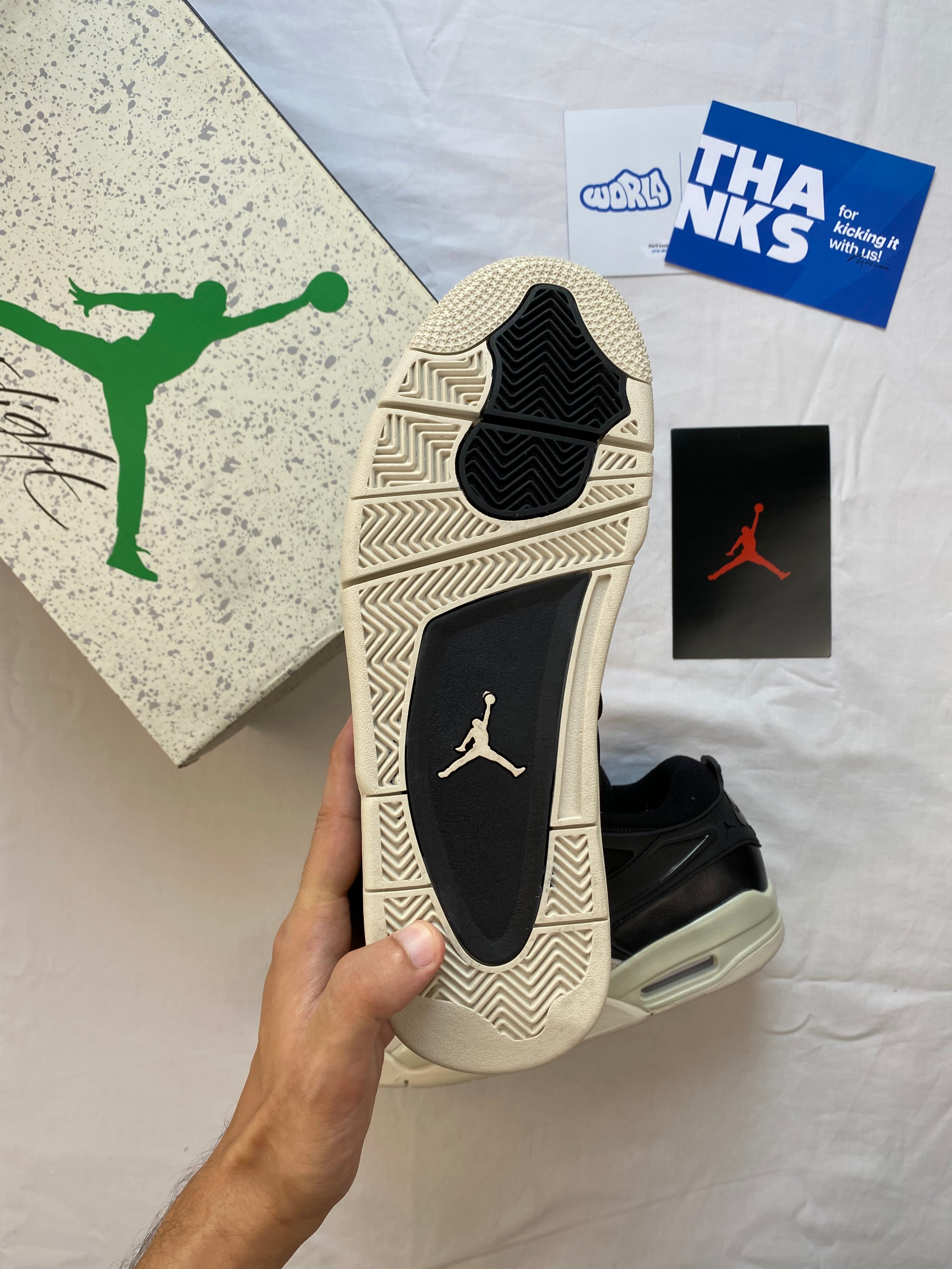 Jordan 4 RM 'Black Light Bone'