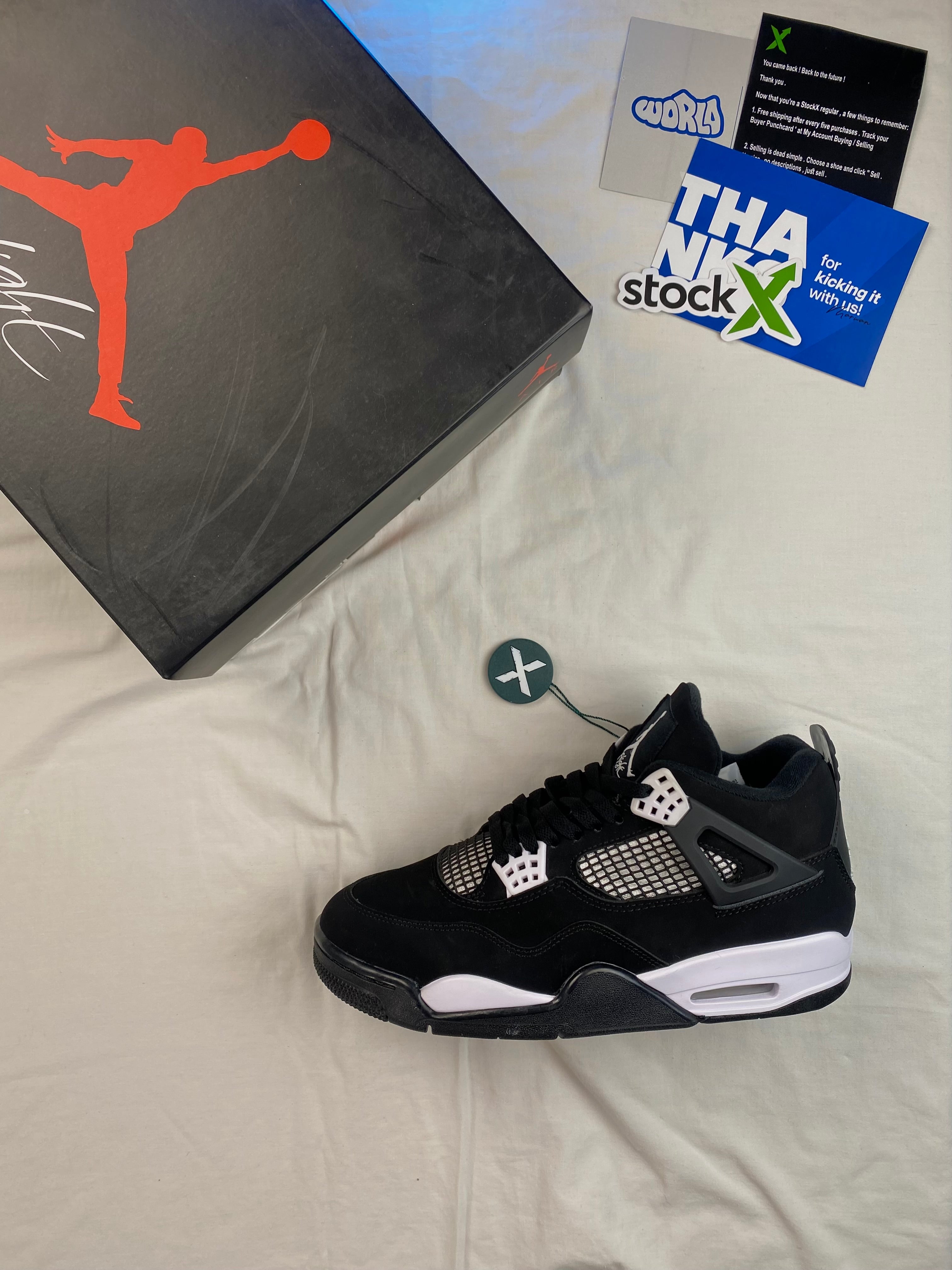 Air Jordan 4 Retro 'White Thunder'