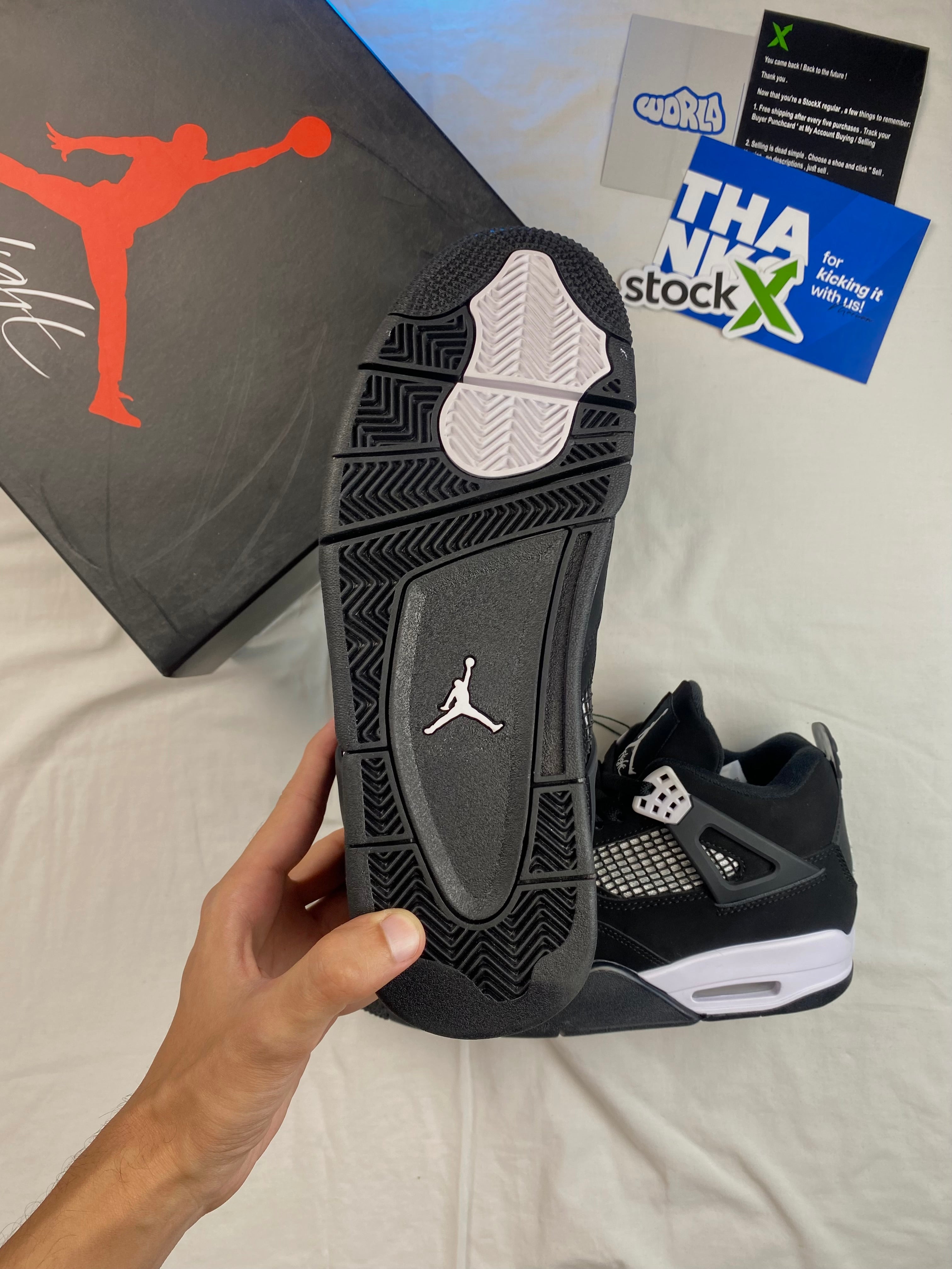 Air Jordan 4 Retro 'White Thunder'