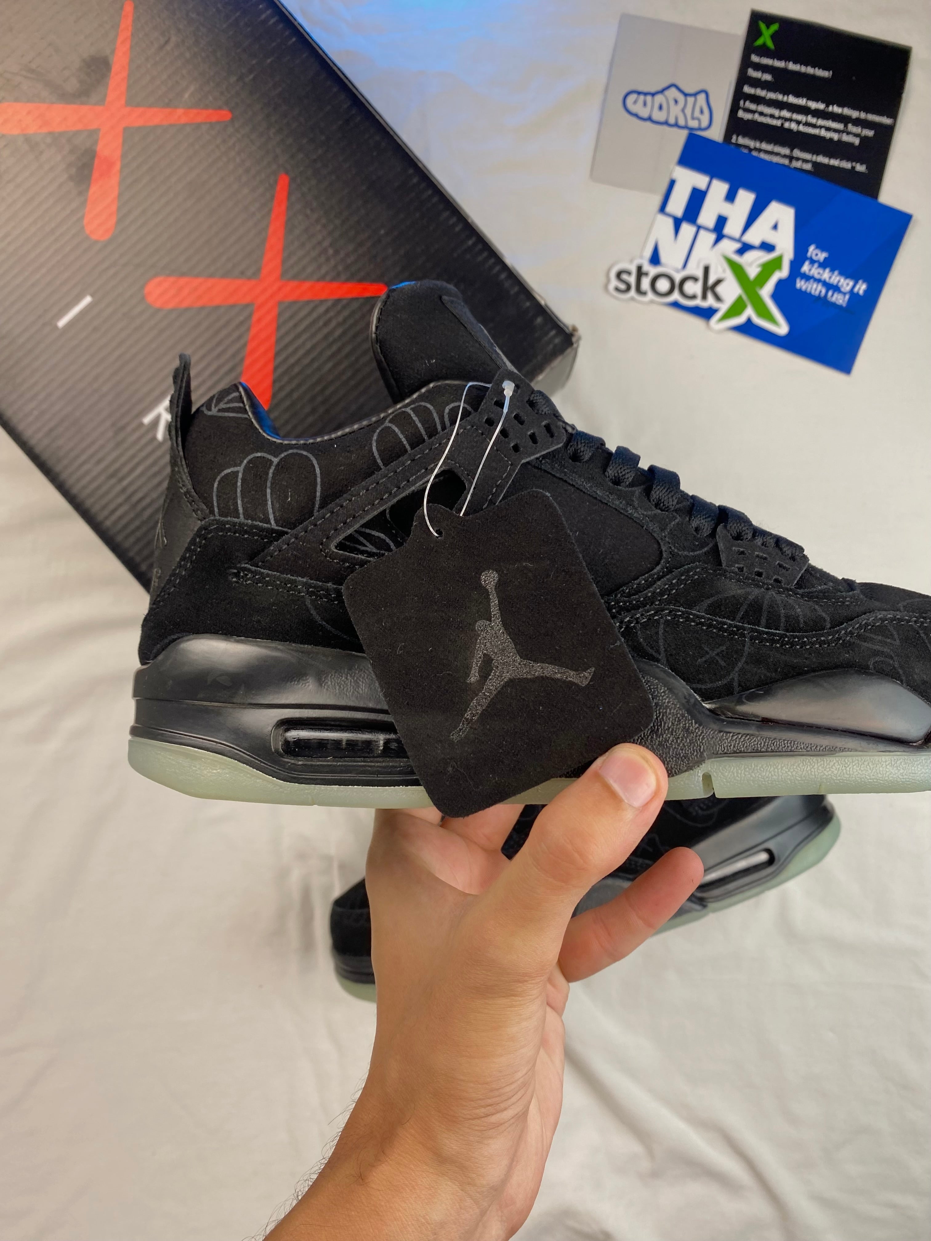 KAWS x Jordan 4 Retro 'Black'