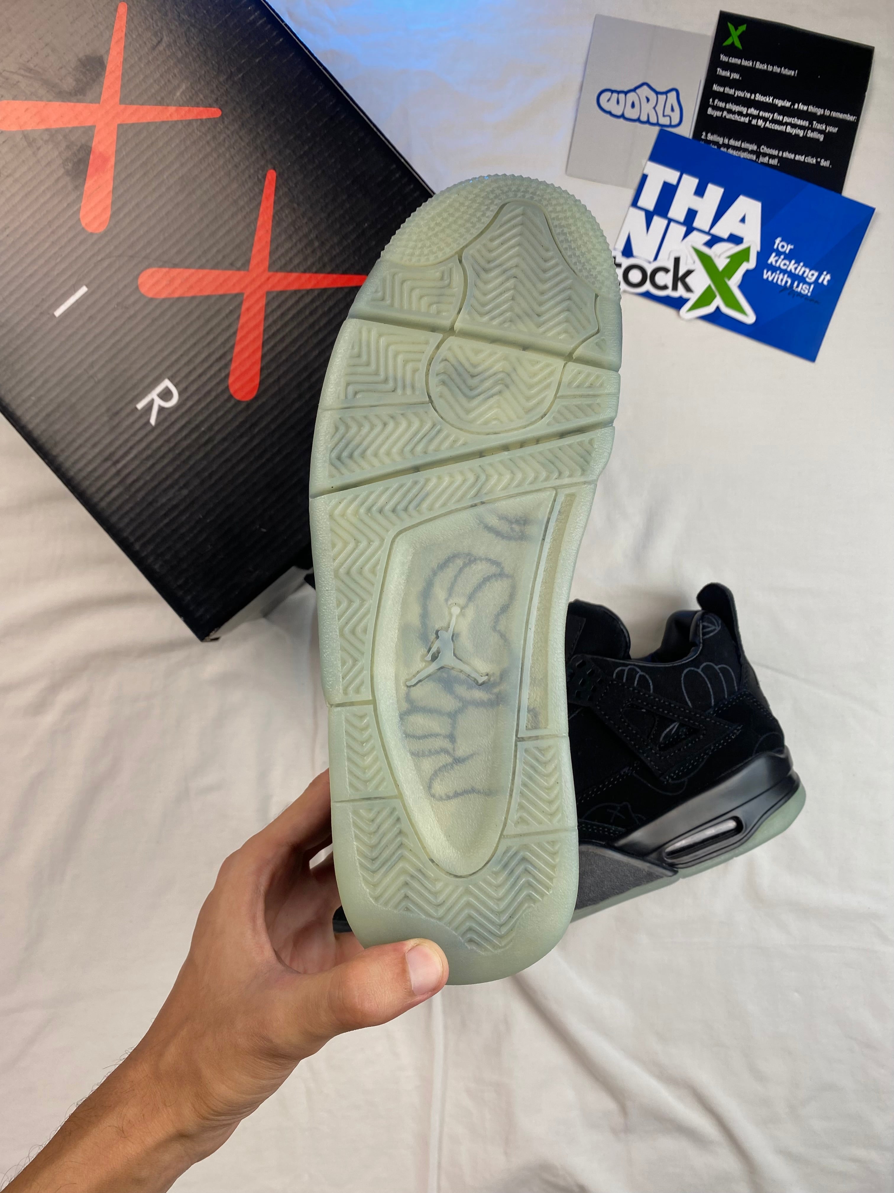 KAWS x Jordan 4 Retro 'Black'