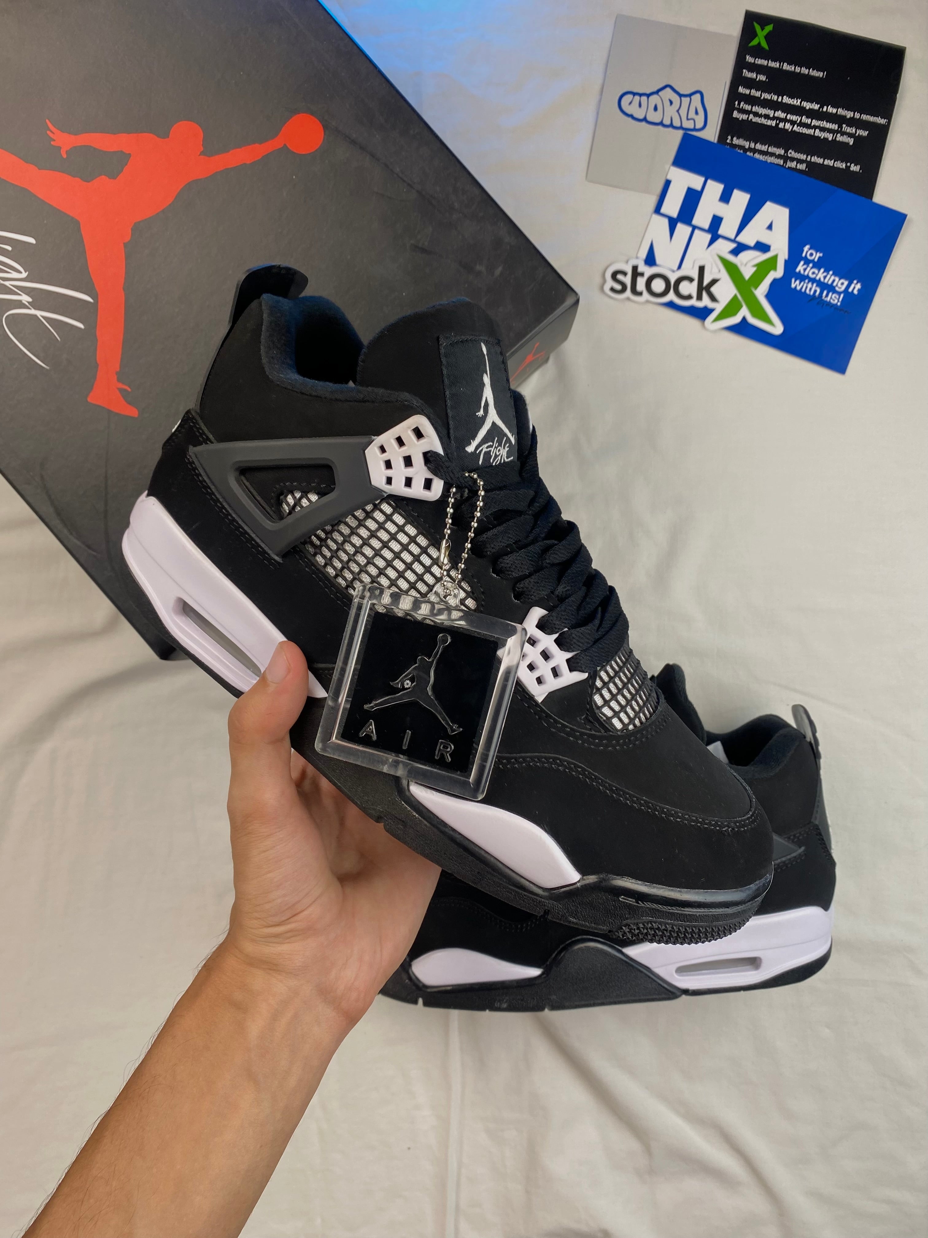 Air Jordan 4 Retro 'White Thunder'