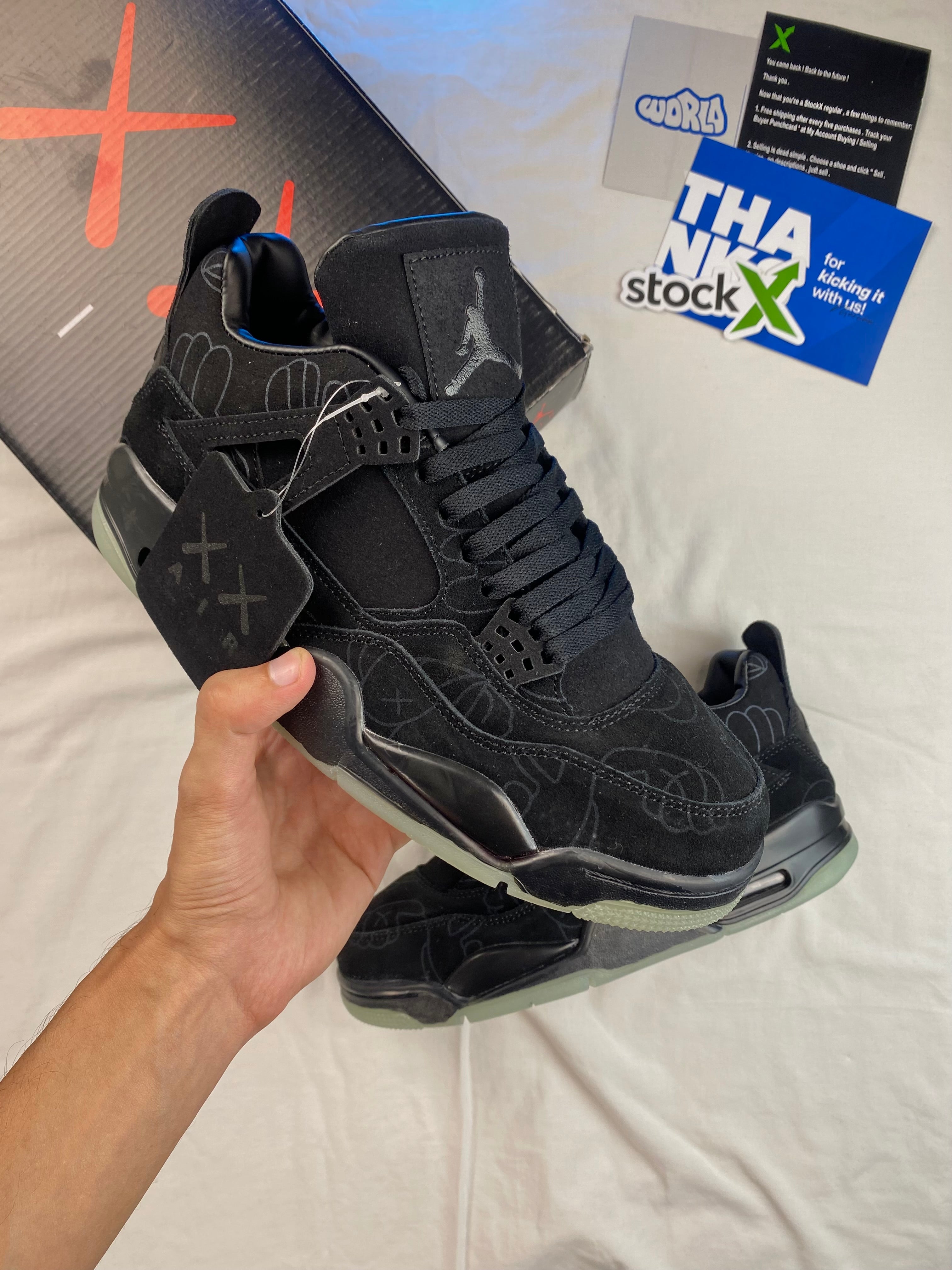 KAWS x Jordan 4 Retro 'Black'