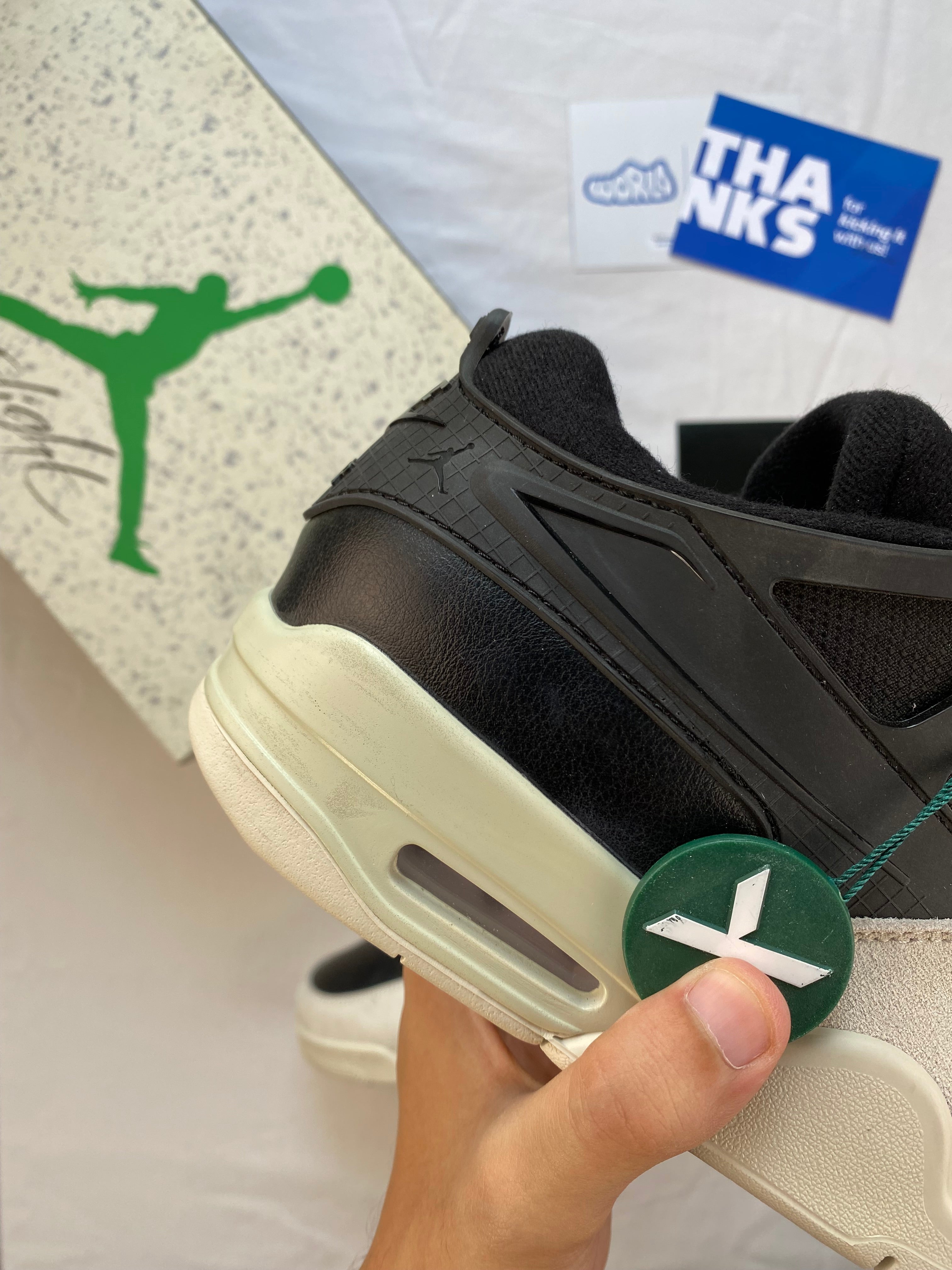 Jordan 4 RM 'Black Light Bone'