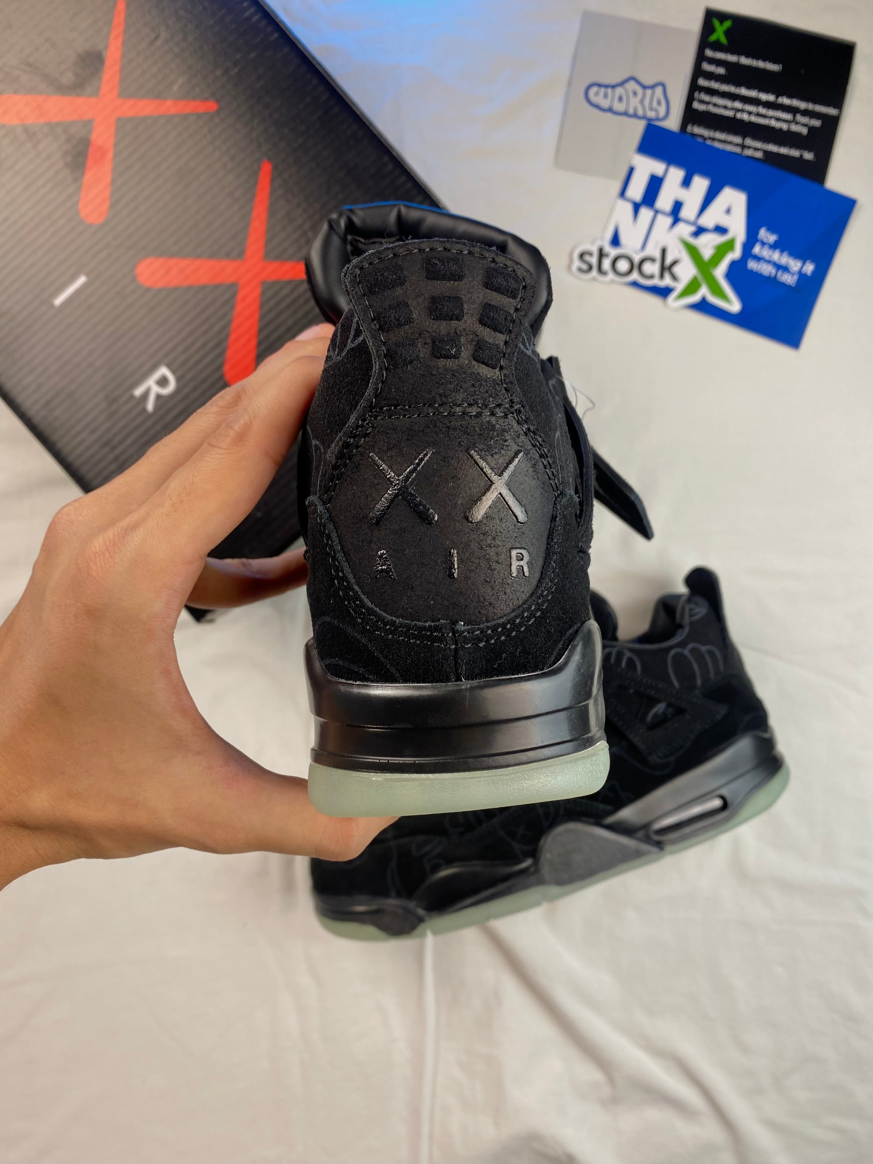 KAWS x Jordan 4 Retro 'Black'