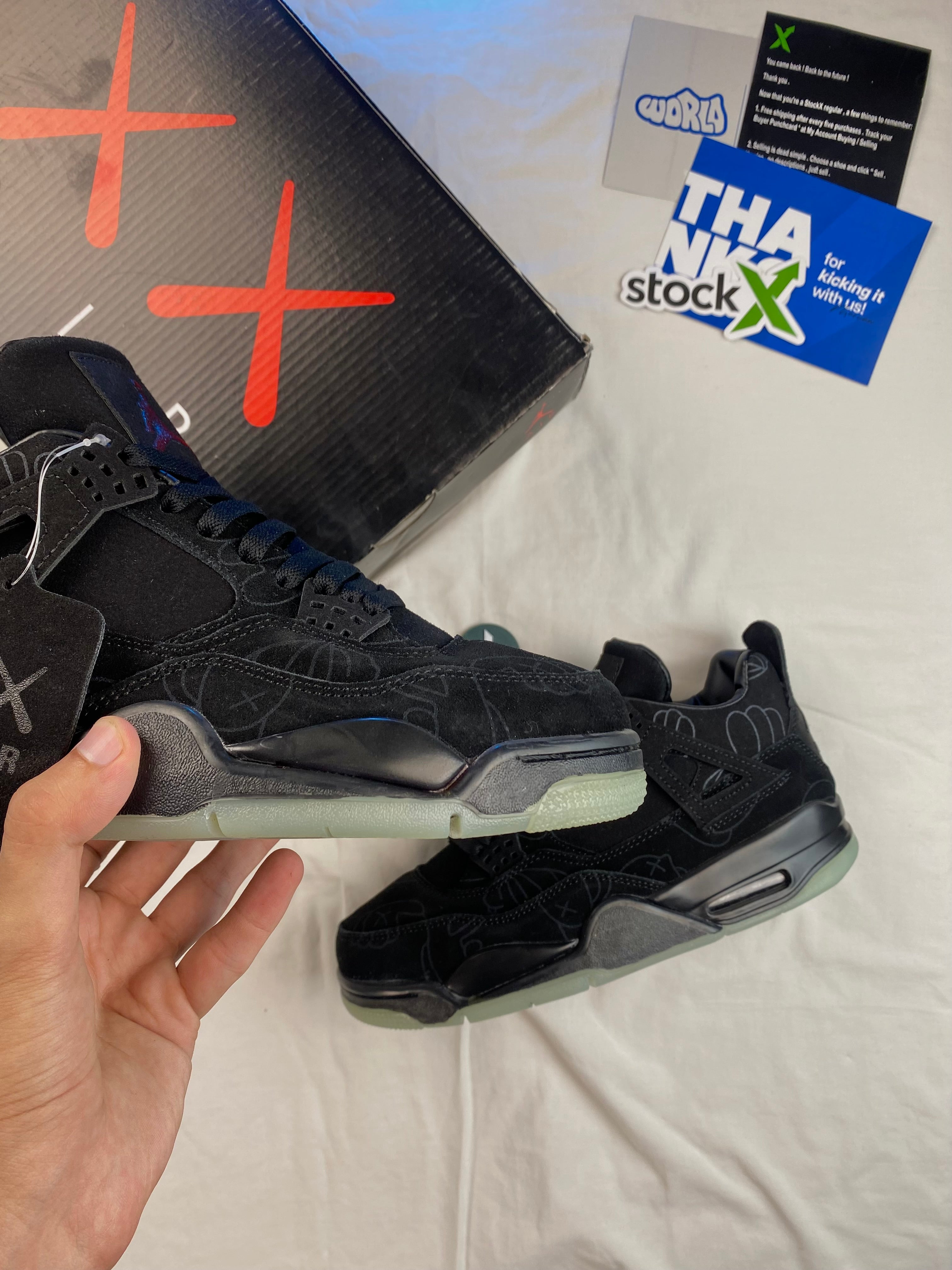 KAWS x Jordan 4 Retro 'Black'