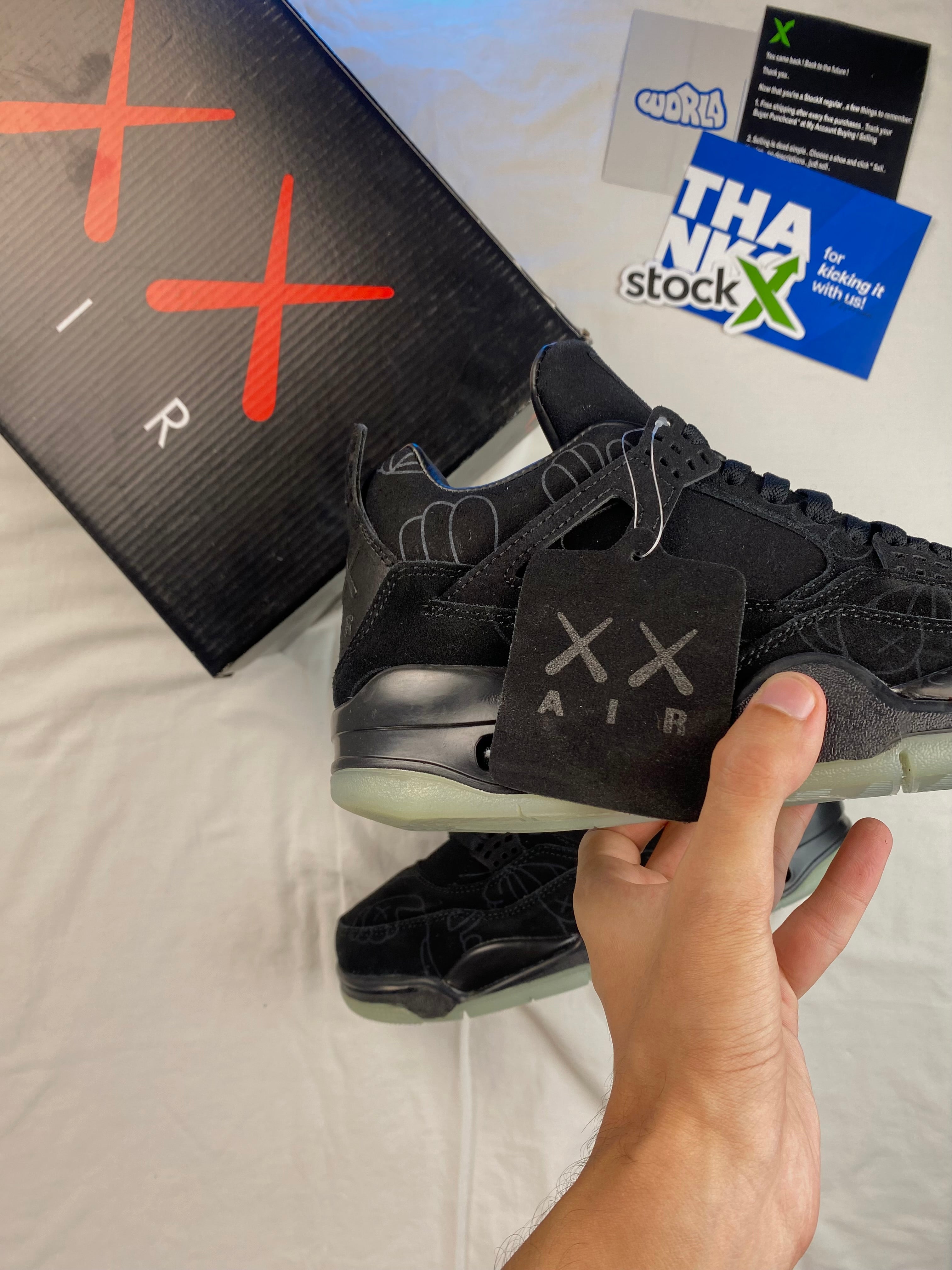 KAWS x Jordan 4 Retro 'Black'