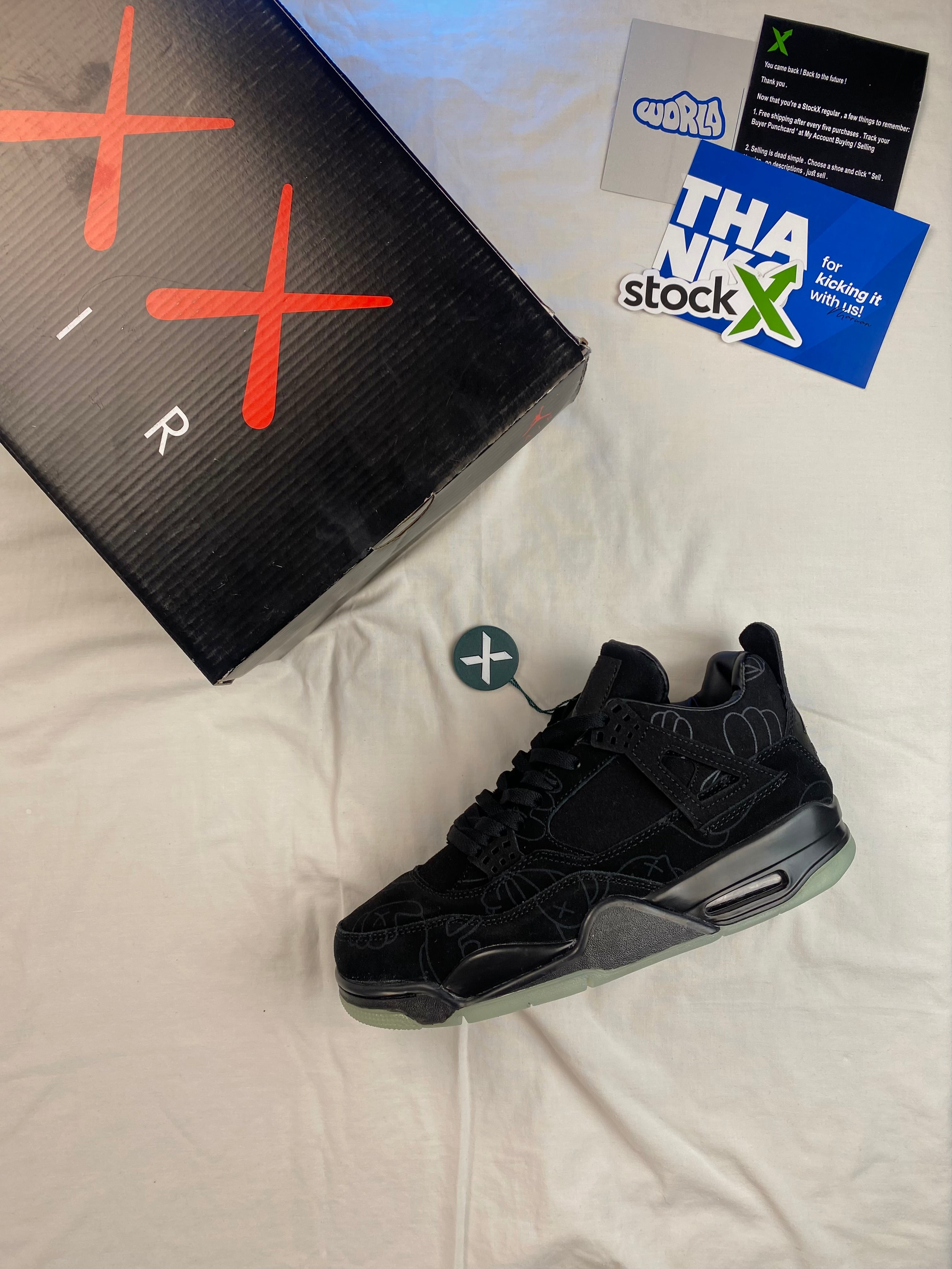 KAWS x Jordan 4 Retro 'Black'