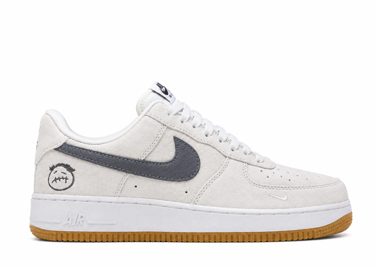 Travis Scott x Nike Air Force 1 in a Light Smoke Grey Suede Dark
